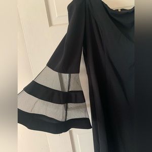 Off the shoulder black dress with bell sleeves